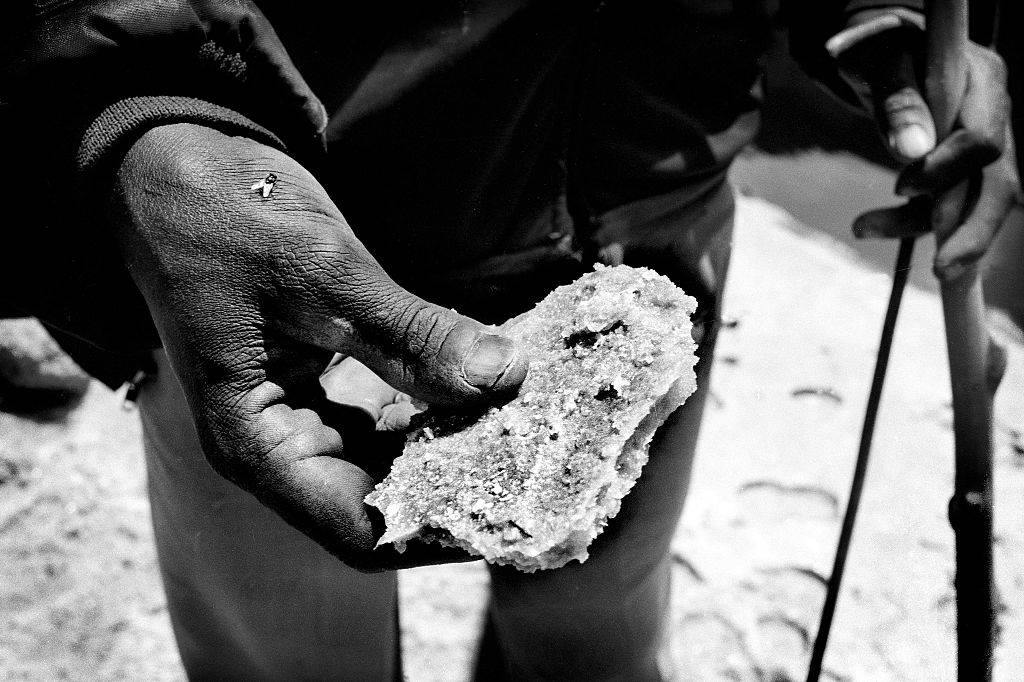 Man holding a salt rock 