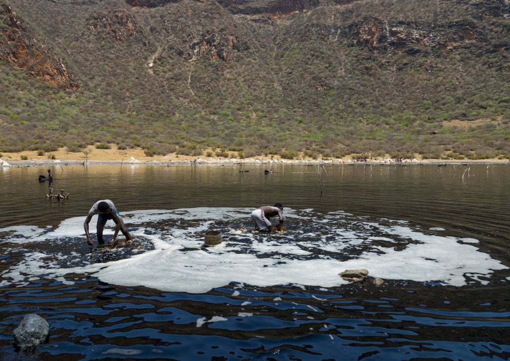 Divers collecting salt 