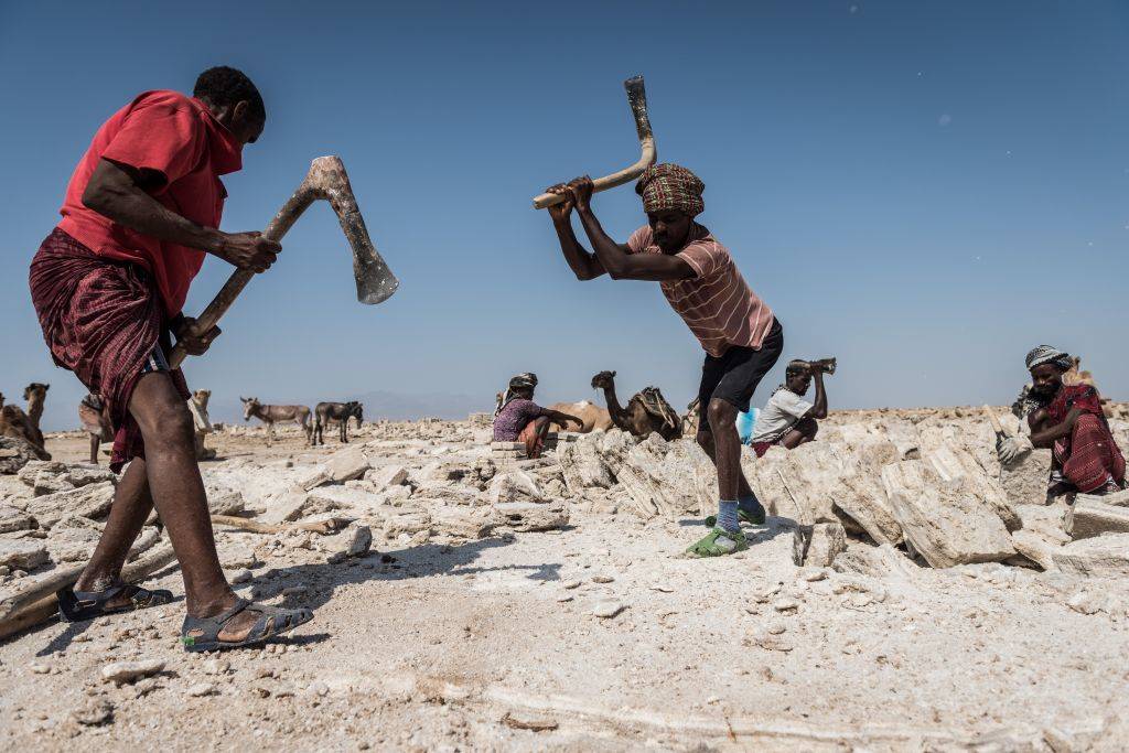 Boy mining salt