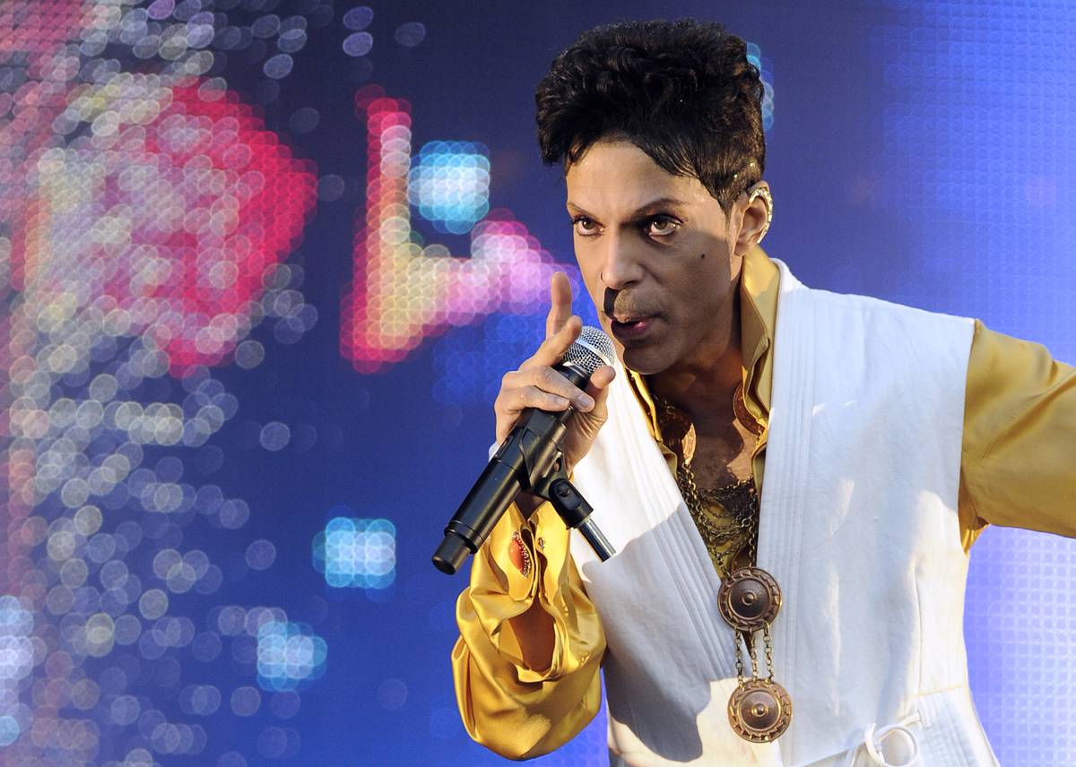 US singer and musician Prince (born Prince Rogers Nelson) performs on stage.