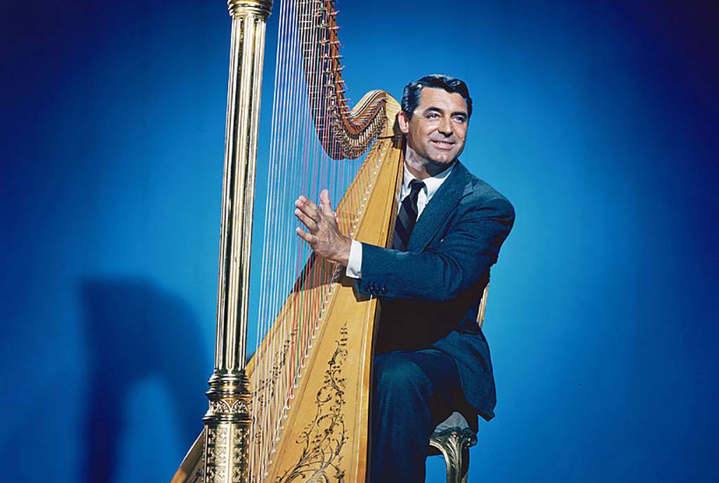 Grant playing the harp 