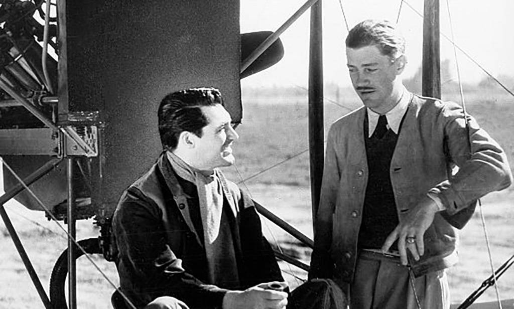 Howard Hughes and Grant on a plane 