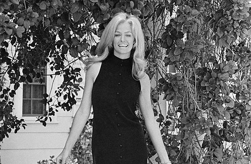 Fawcett in a black dress