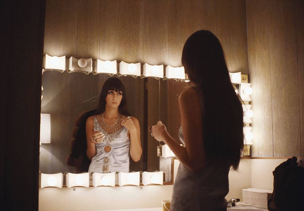 Cher gets ready in her dressing room.