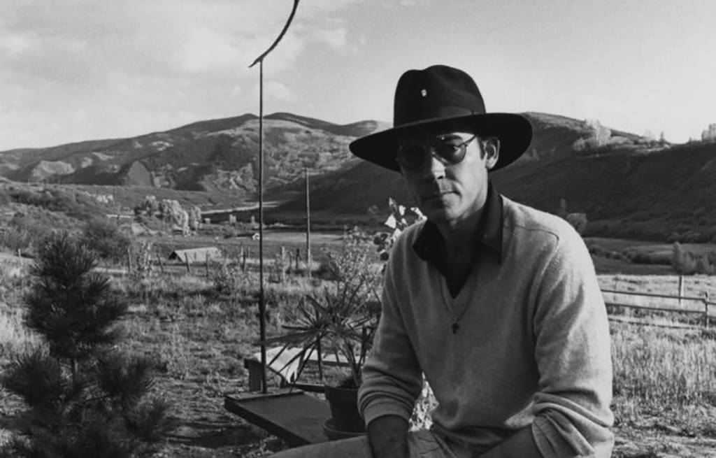 Thompson wearing a hat