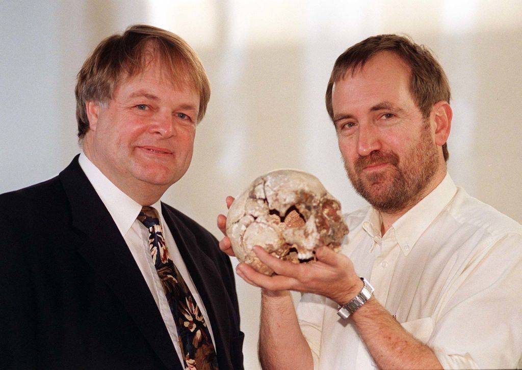 Chris Stringer with a skull 