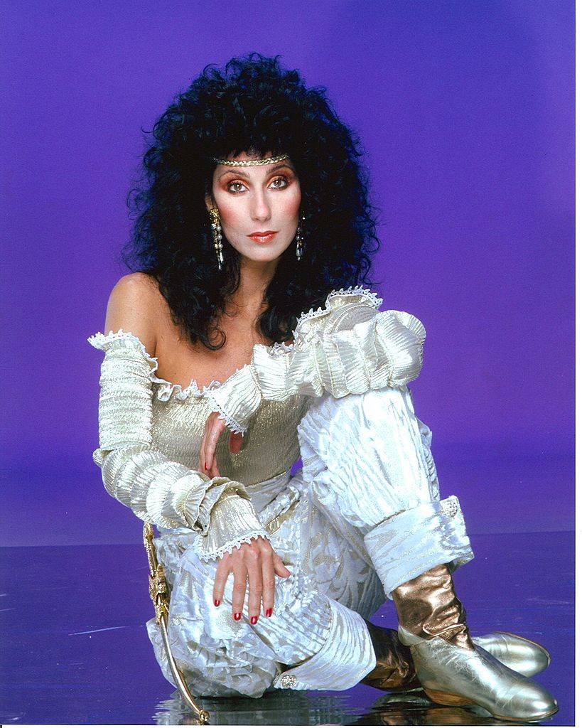 Cher models an '80s era outfit.