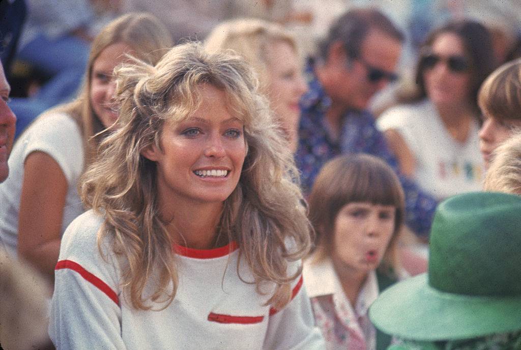 Fawcett at a tennis match