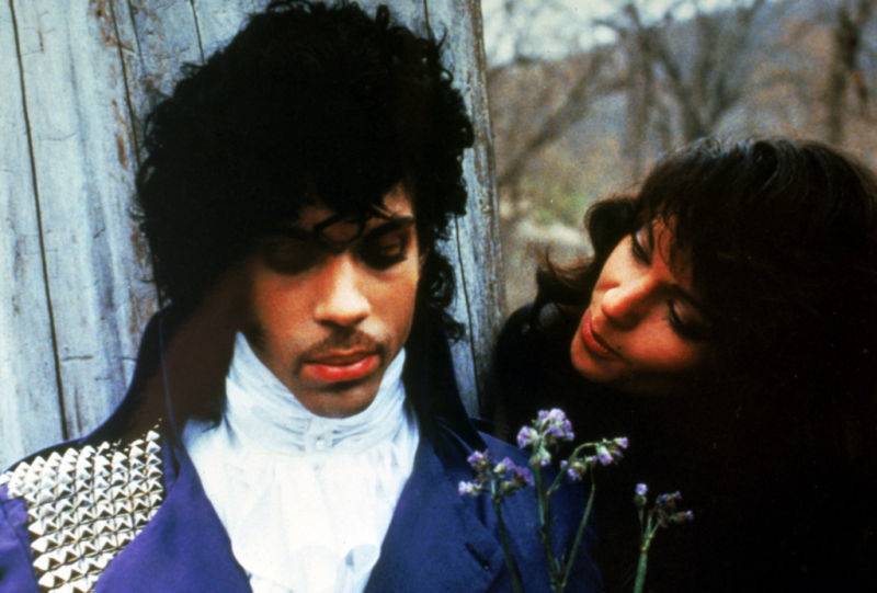 Prince and Apollonia Kotero act in the movie Purple Rain.