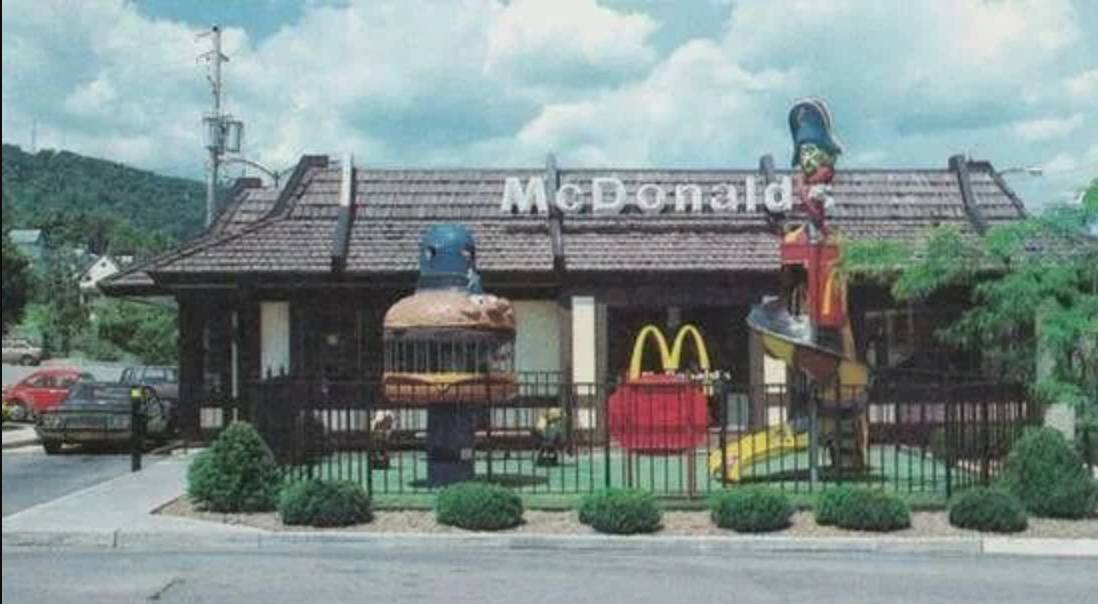 outdoor playplace with equipment shaped like burger