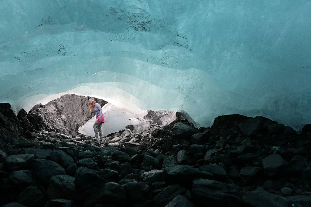 Woman in an ice cave