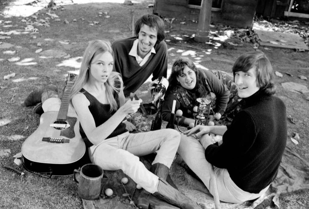 Band sitting on the ground