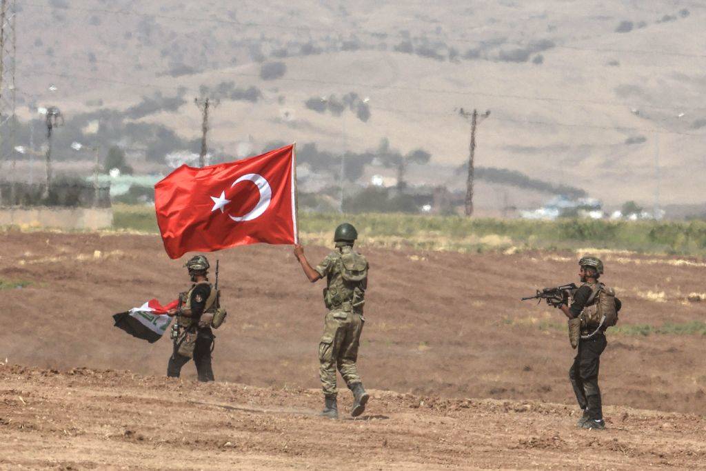 Man holding Turkish flag 