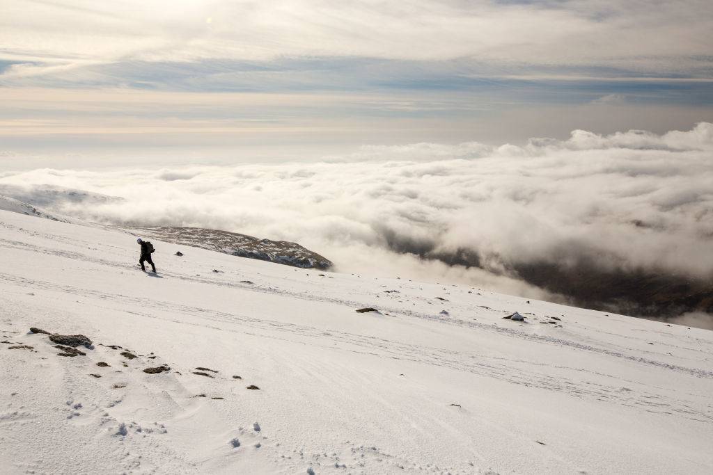 Man climbing mountain 