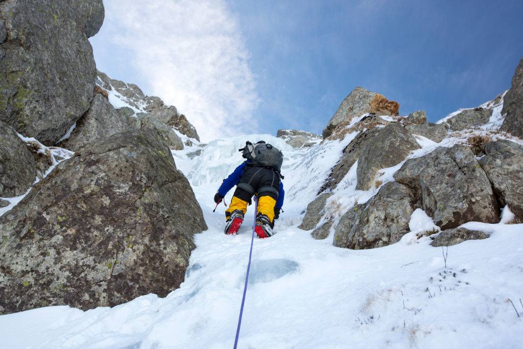 Man climbing mountain 