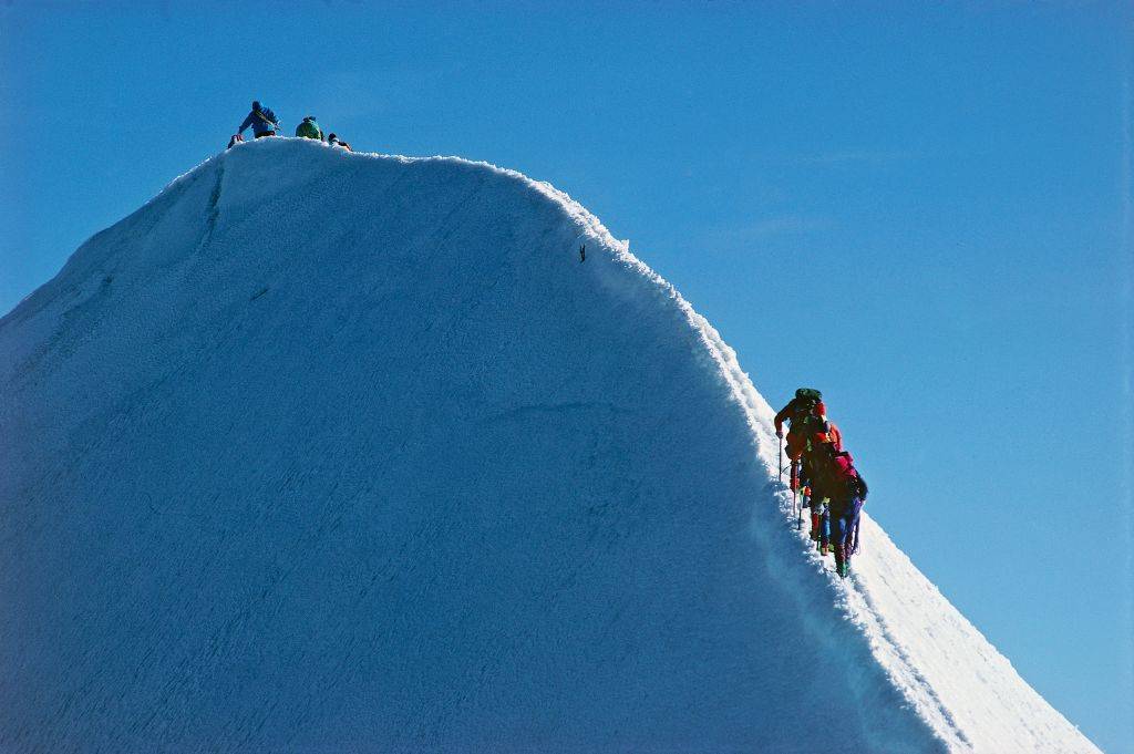 People high on a mountain 