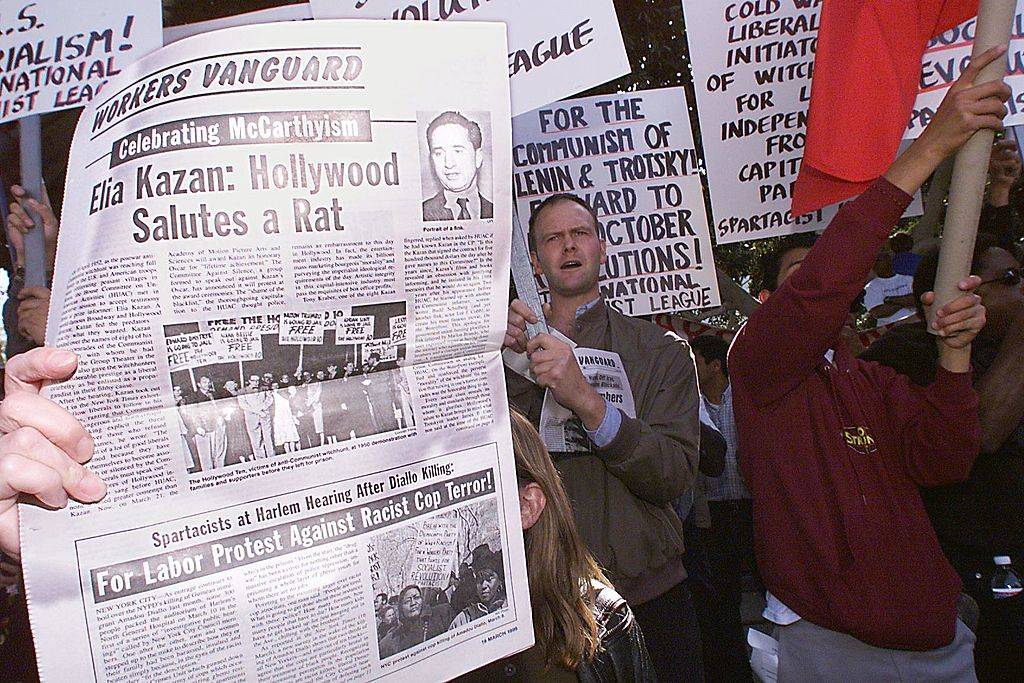 This file photo dated 21 March 1999 shows protestors demonstrating against the Lifetime Achievement Award to be presented to US film director Elia Kazan