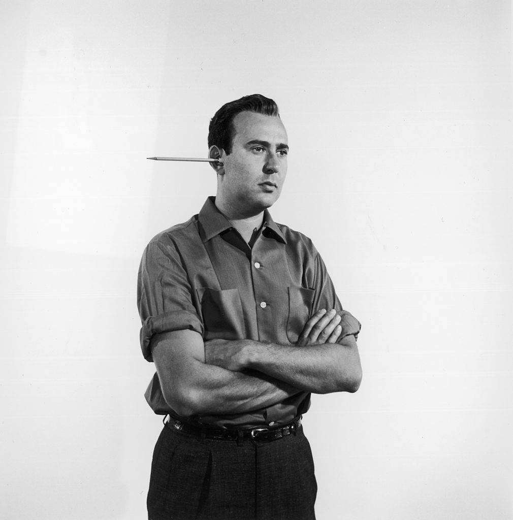 15th September 1955: American actor and comedy writer Carl Reiner with a pencil protruding from one ear.