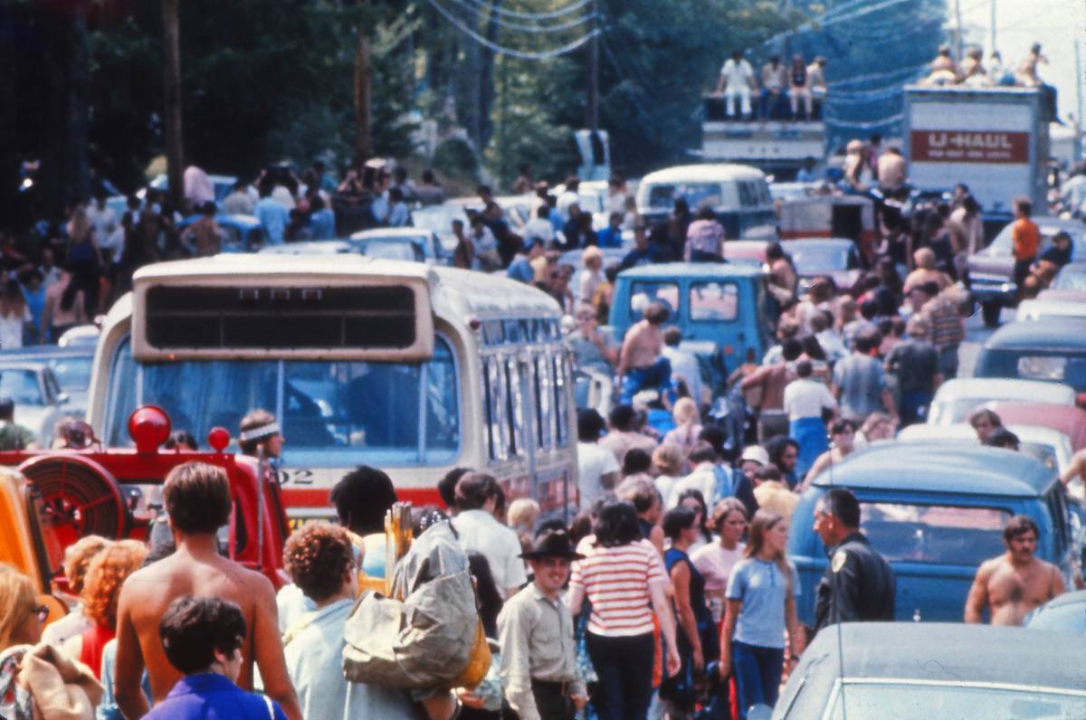 People Making Their Way To Woodstock In The Summer Of '69