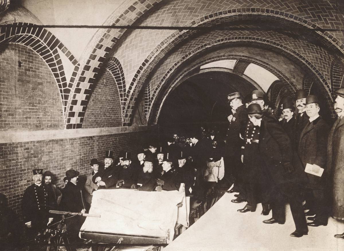 Financiers, city officials, and policemen ride New York City's first subway on October 27, 1904 at City Hall station