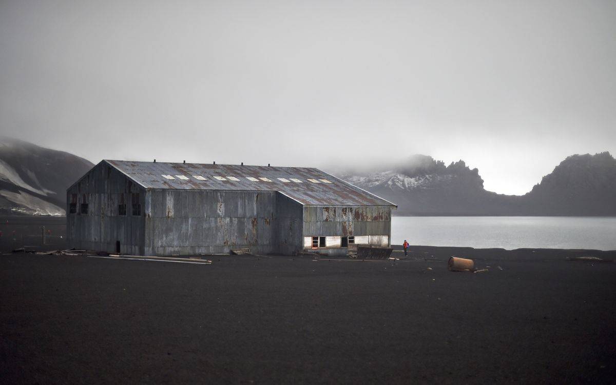 View of a derelict hangar at Whalers Bay in Deception Island, in the western Antarctica peninsula