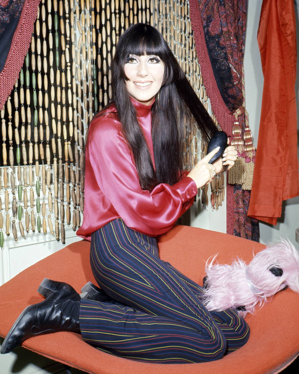 Cher Brushes Hair