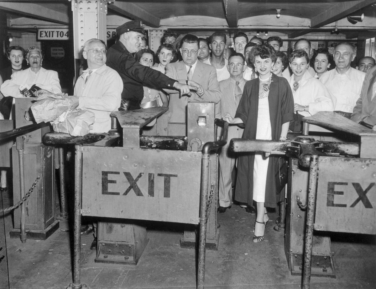 People Waiting to Use New Subway Token