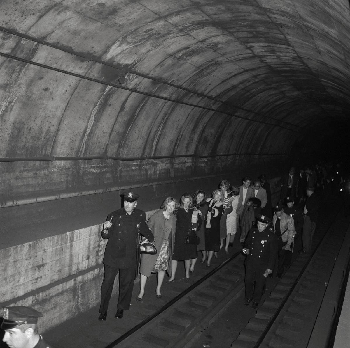 Policemen Leading Subway Passengers to Safety