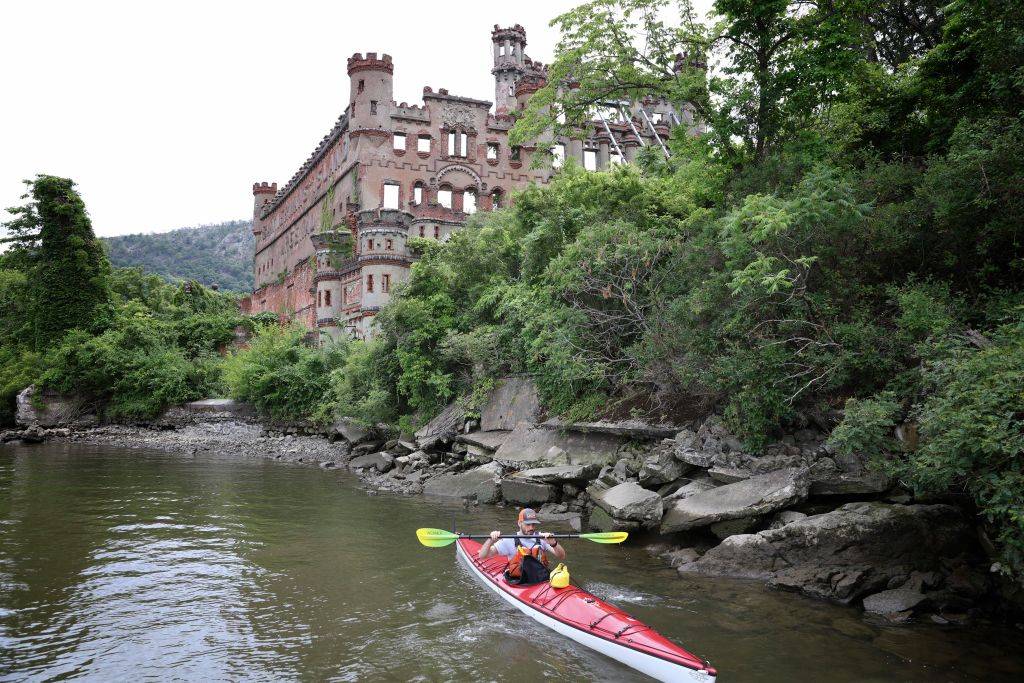 People kayaking around the island
