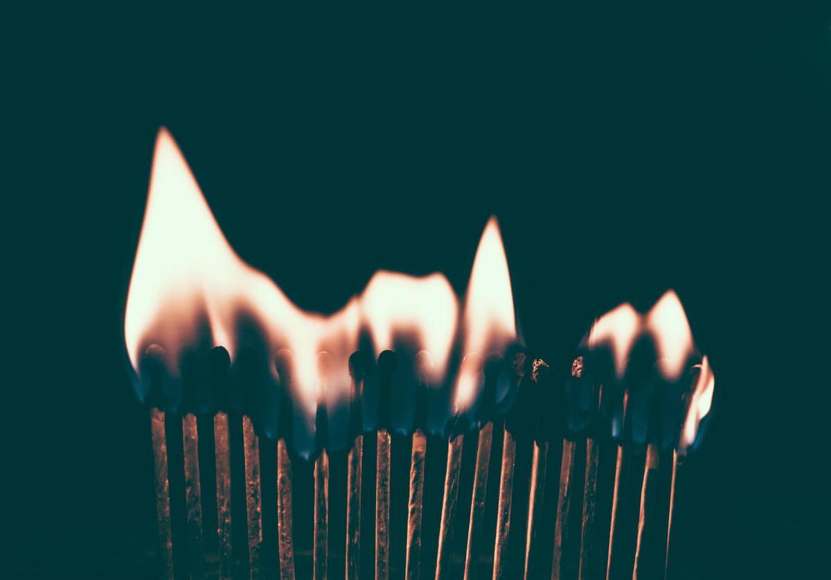 lit matches side by side