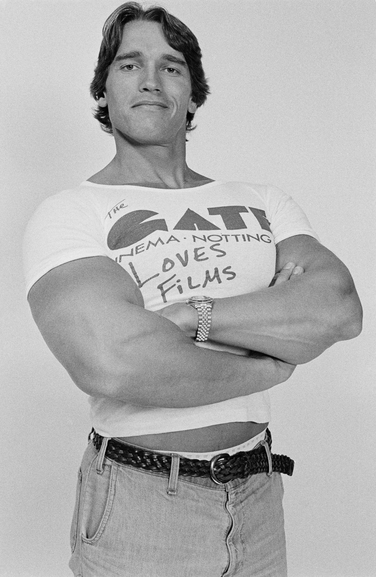 Arnold Schwarzenegger posing for a photo