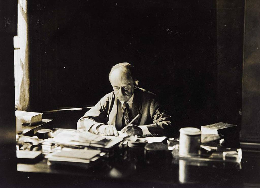 Barrie sitting at a desk
