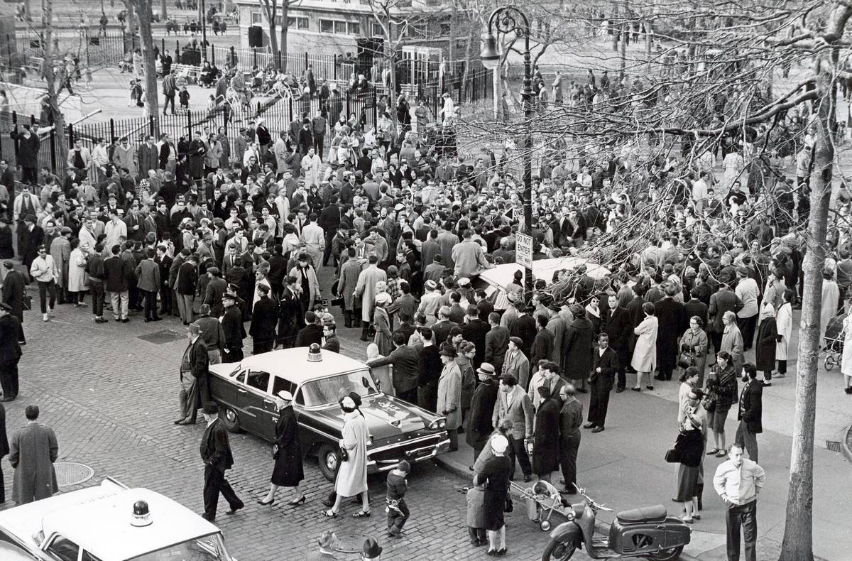 A crowd protests ban on folk music in Washington Square Park in 1961