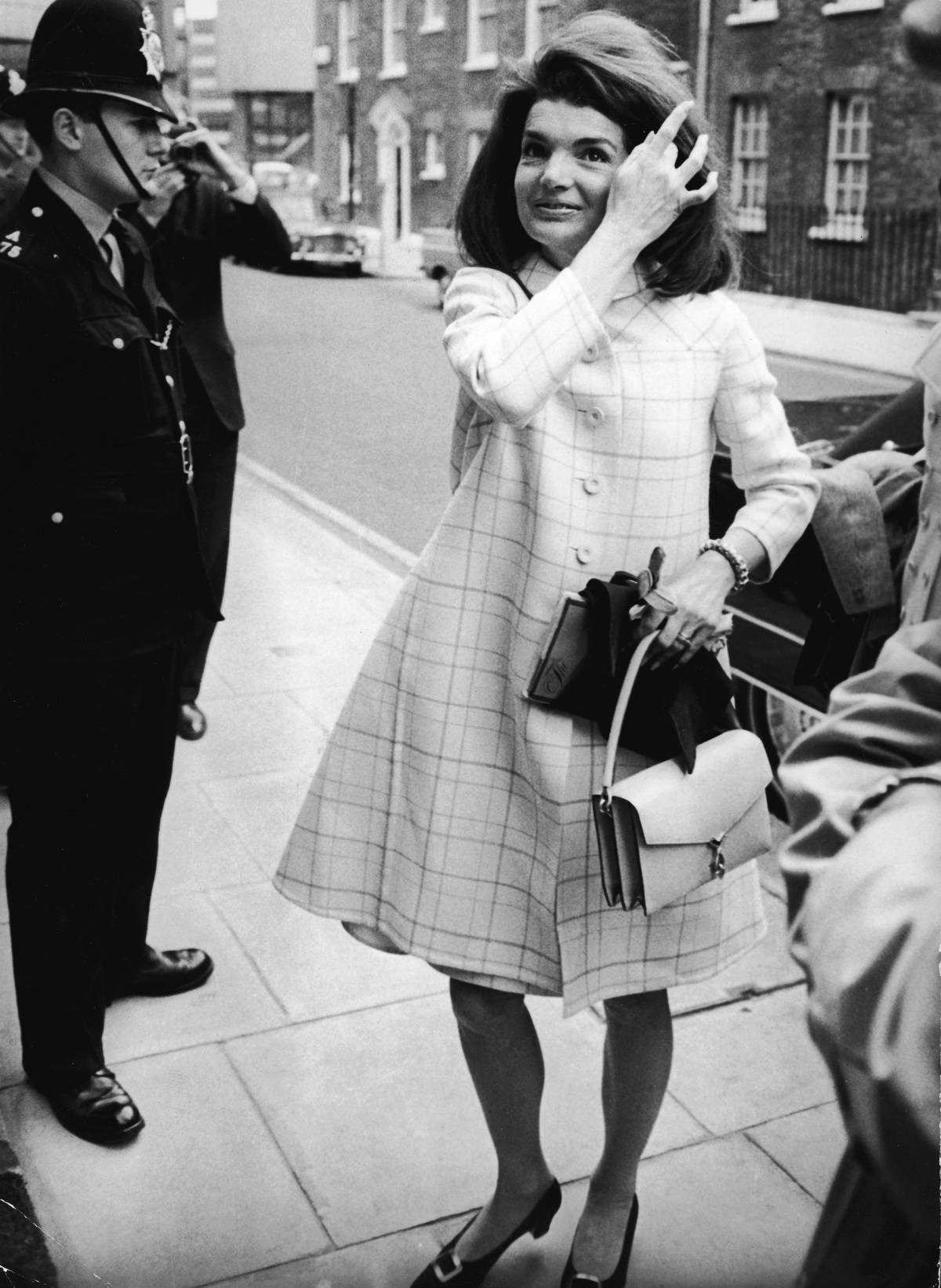 Jackie Kennedy Fixes Her Hair
