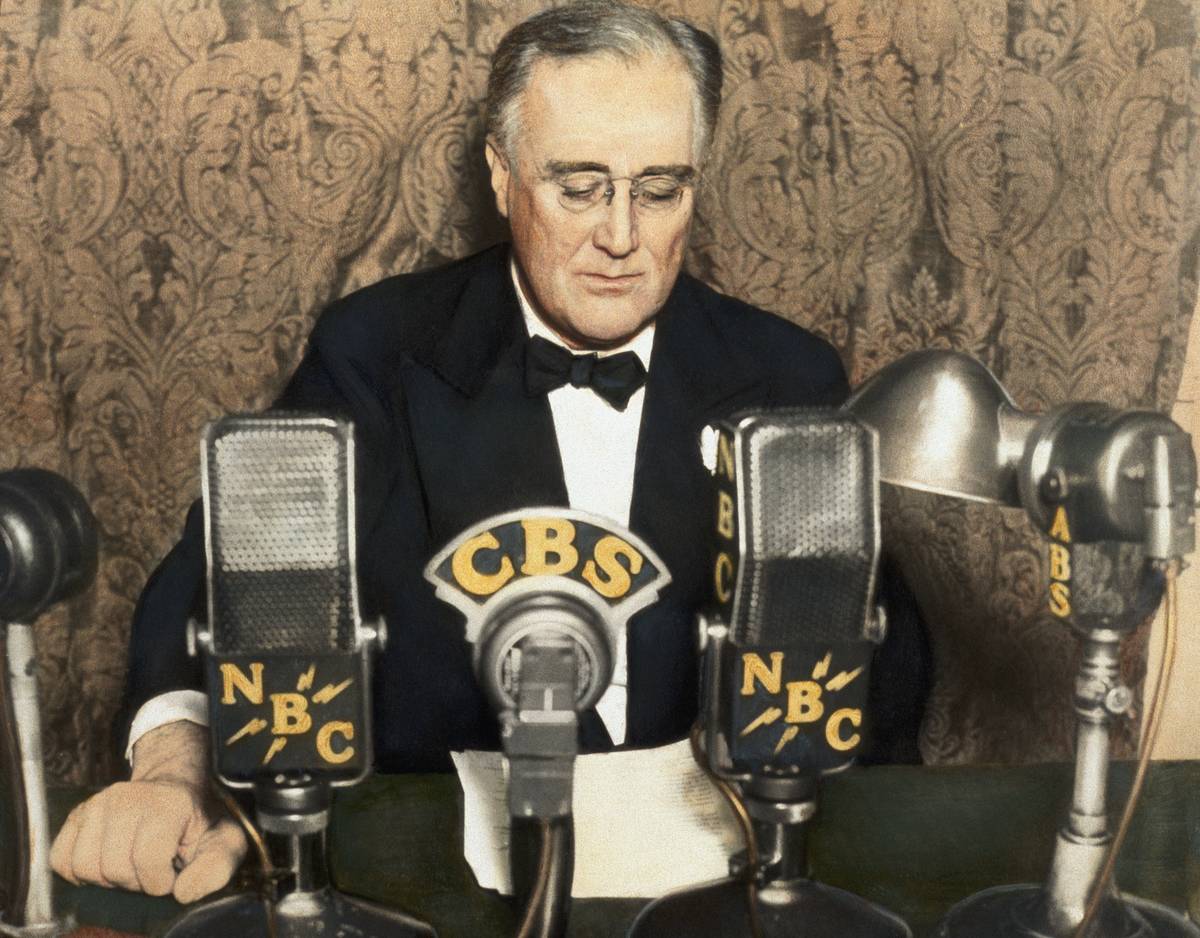 Franklin Roosevelt delivers a radio address.
