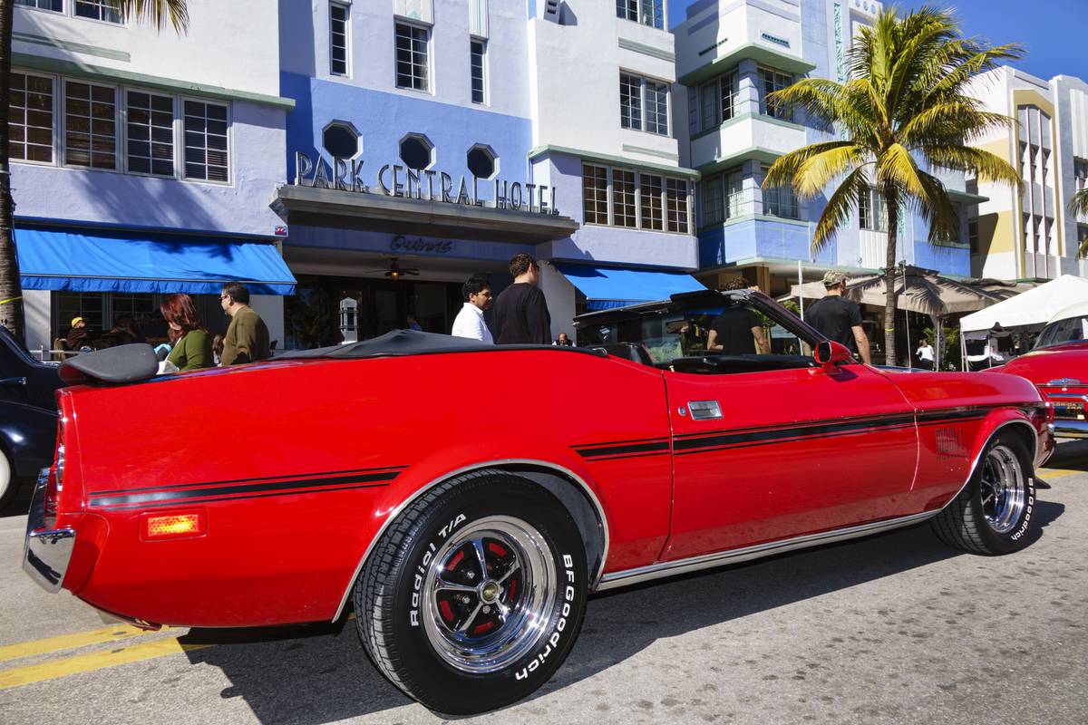 1973 Ford Mustang convertible at an antique classic car automobile show.