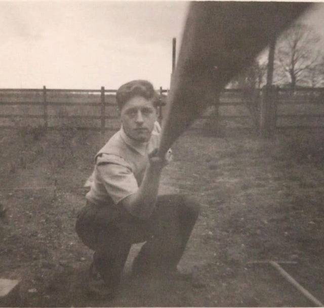man using stick to take a selfie