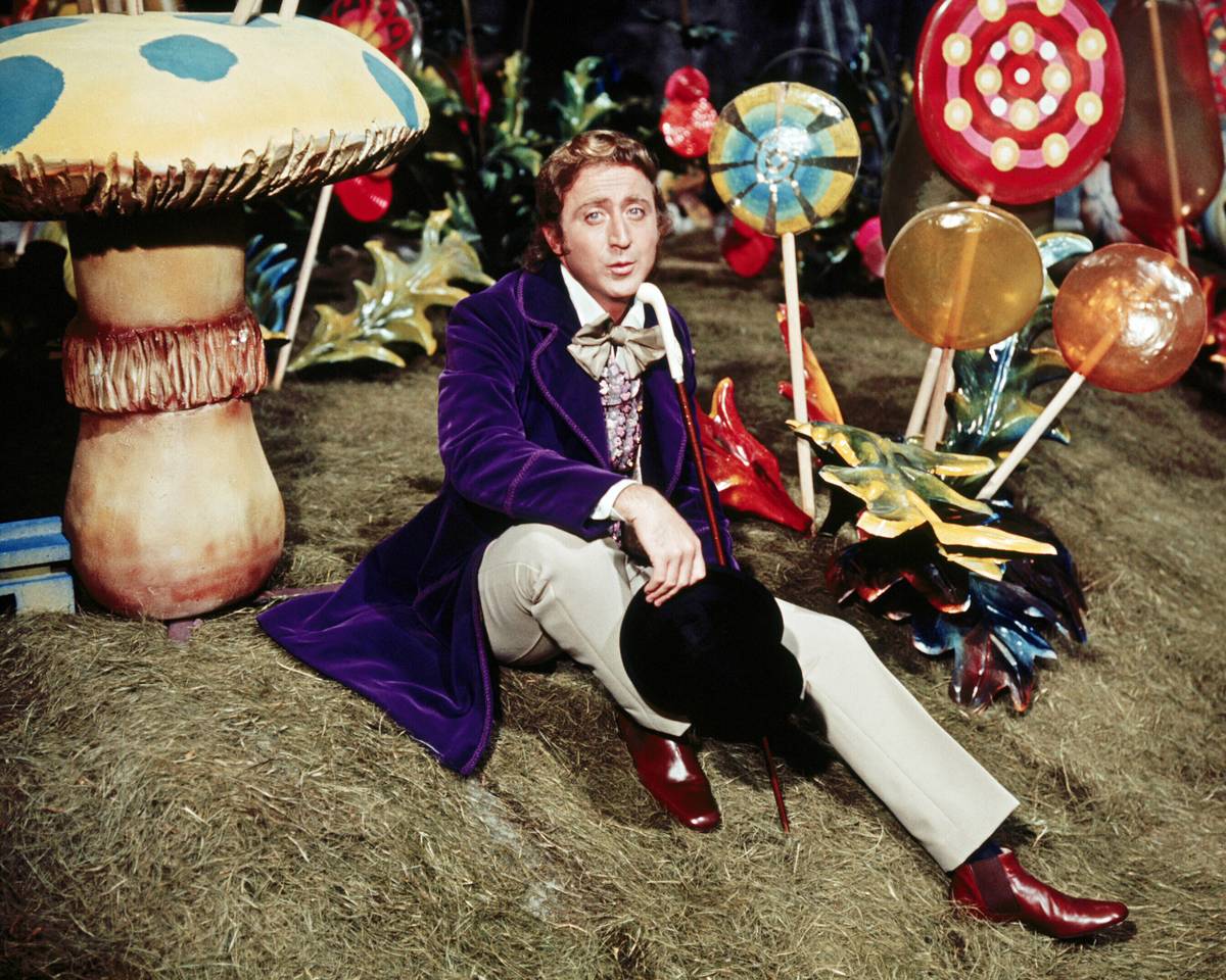 Willy Wonka sitting on a hill