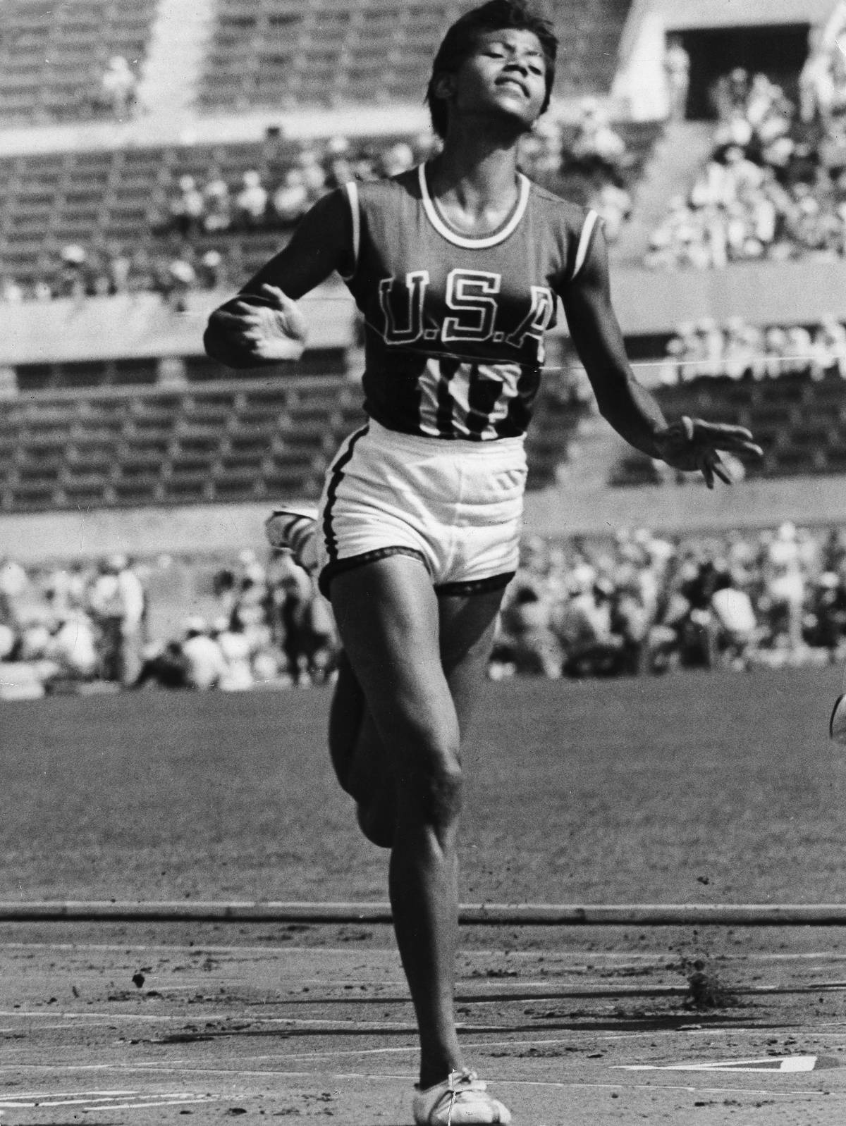 Wilma Rudolph runs at the 1960 Olympics.