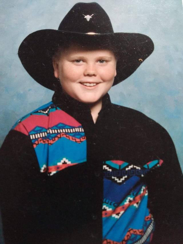 young boy in cowboy hat