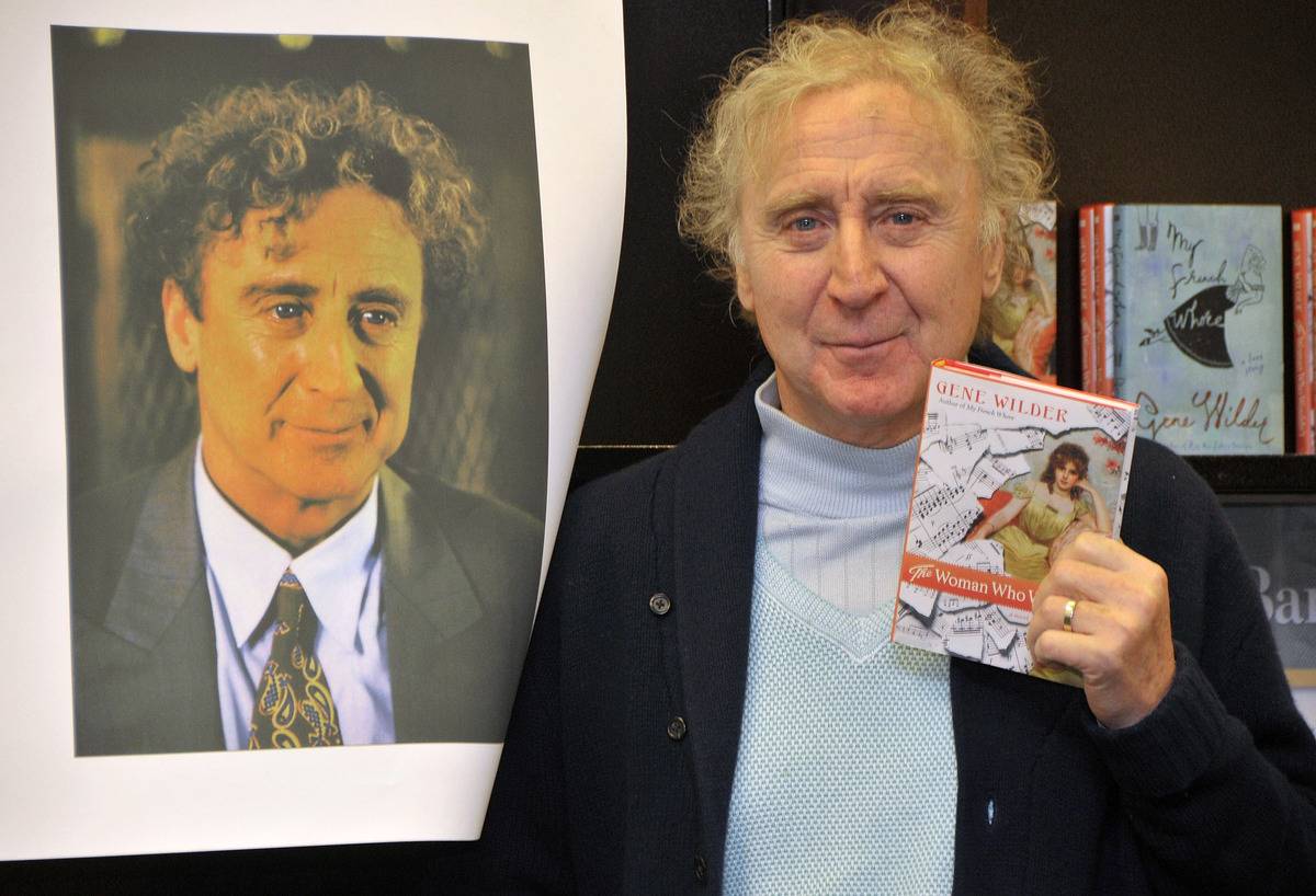 Gene Wilder posing with one of his three novels