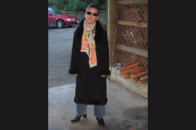 posing in matrix outfit