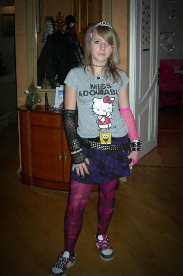 girl wearing miss adorable hello kitty t-shirt, tiara, stockings and SpongeBob belt