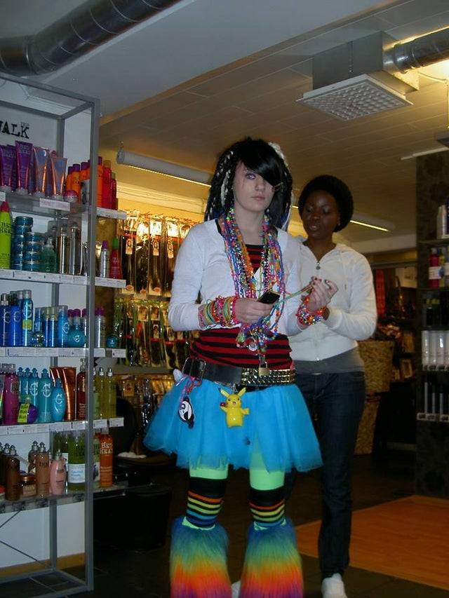 girl with coloful outfit and plenty of plastic accessories