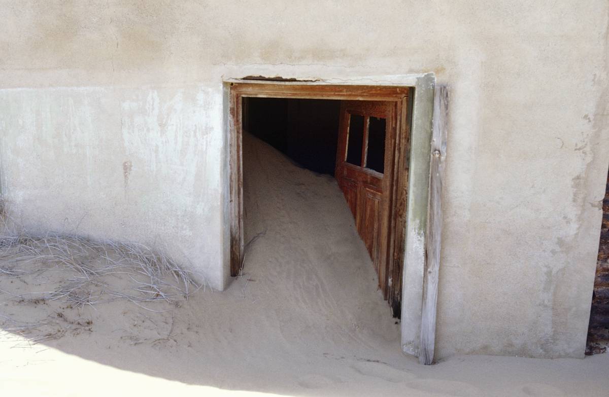 Sand invades a home in Kolmanskop, the ghost town of Namibia.