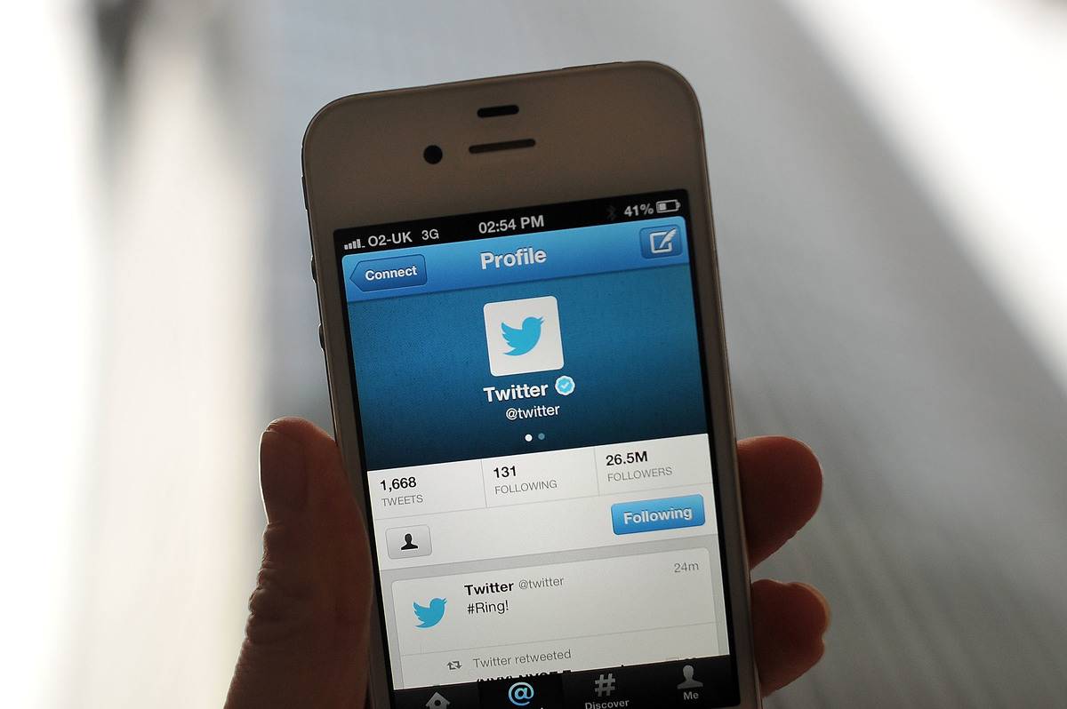 Twitter appears on a smartphone screen.