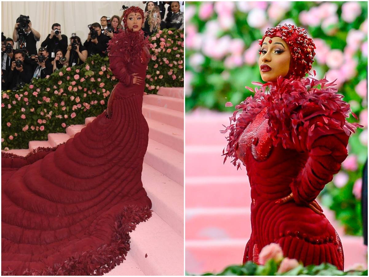 Cardi B walks into the 2019 met gala with her massive gown.