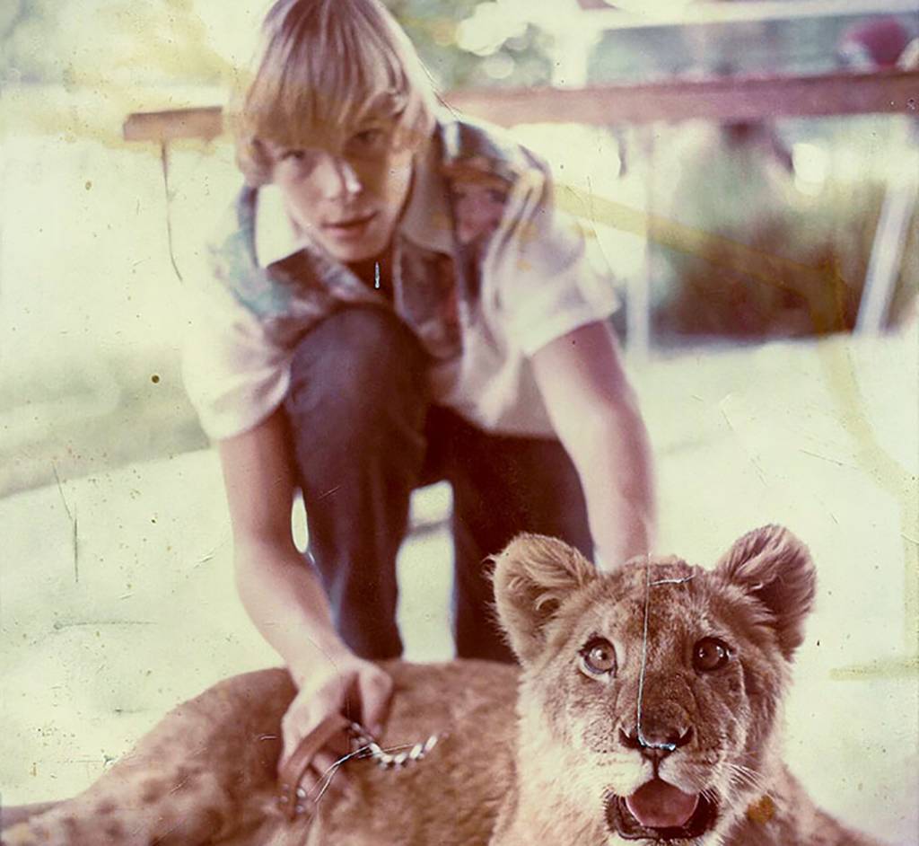 Picture of kid with lion
