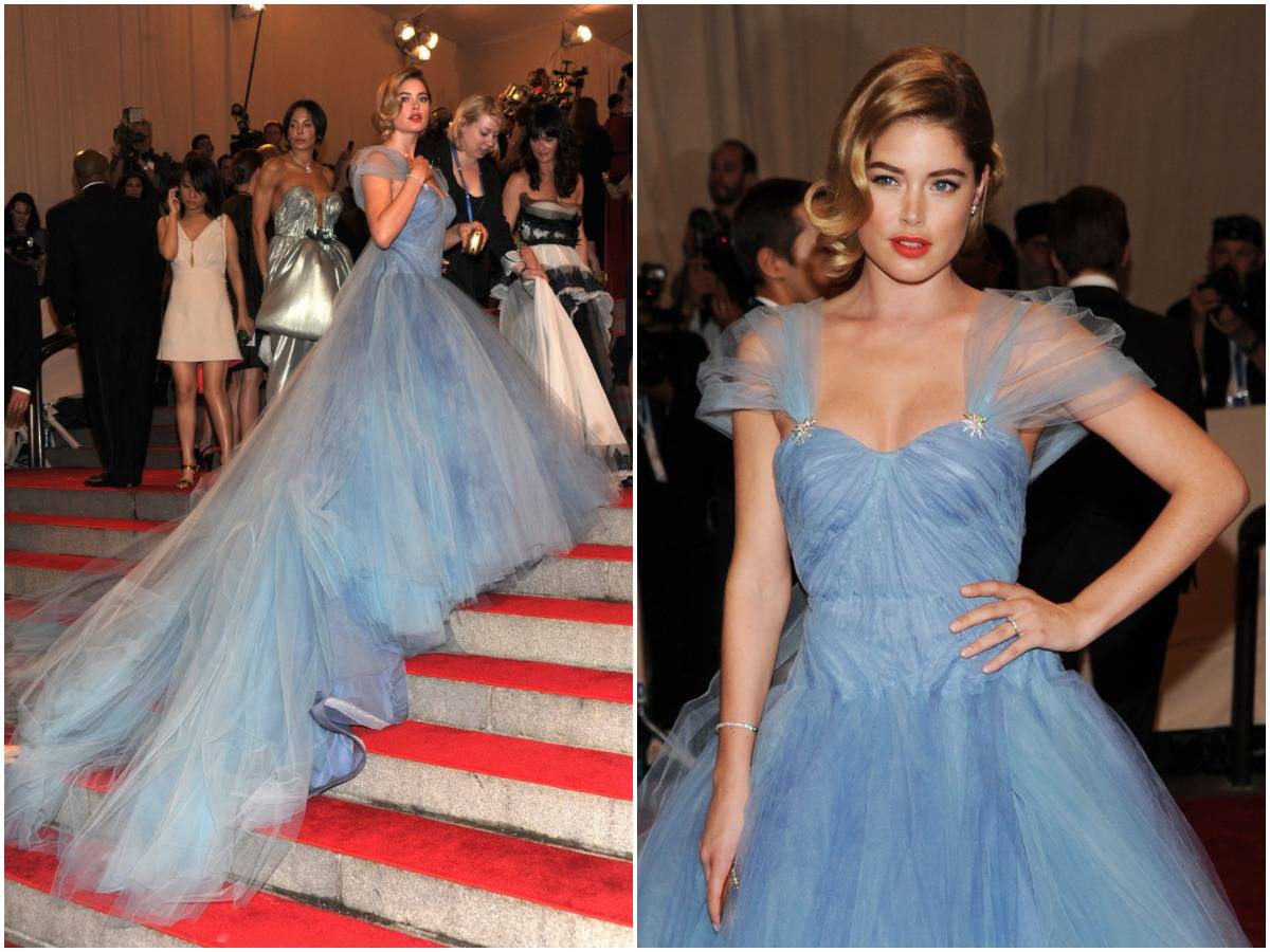 Doutzen Kroes walks into the Met Gala with her dress trailing behind her, 2010.
