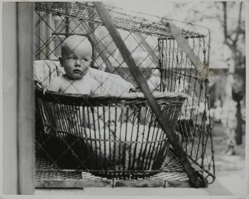 Baby in a cage